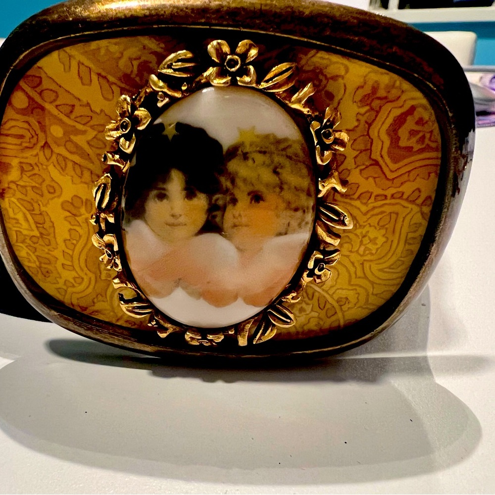 Allison Daniel’s Cherub belt buckle “Fiorucci style”